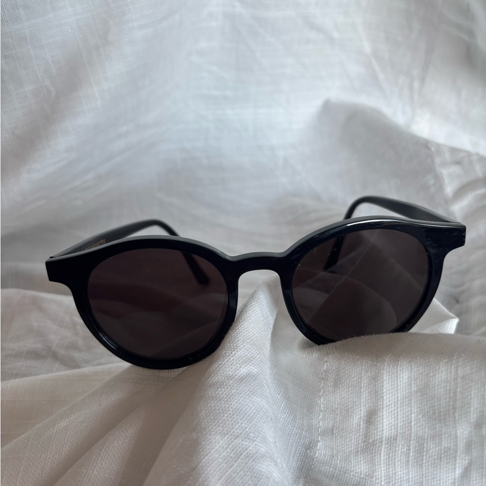 Gentle Monster Black Sunglasses with Gold Accents - Picture 3 of 9